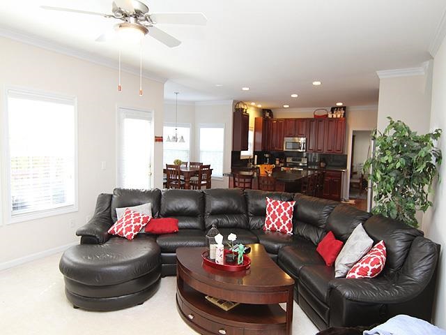 164 Mickleson Ridge Drive Raleigh, NC 27603 - Photo 10 of 25 a living room with furniture and a chandelier