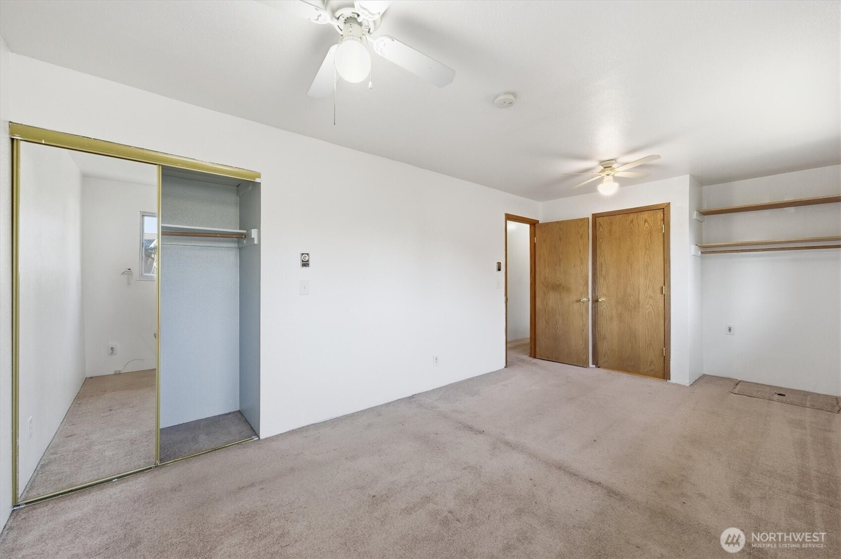 4759 Windemere Street Longview, WA 98632 - Photo 15 of 38 a view of an empty room with a ceiling fan