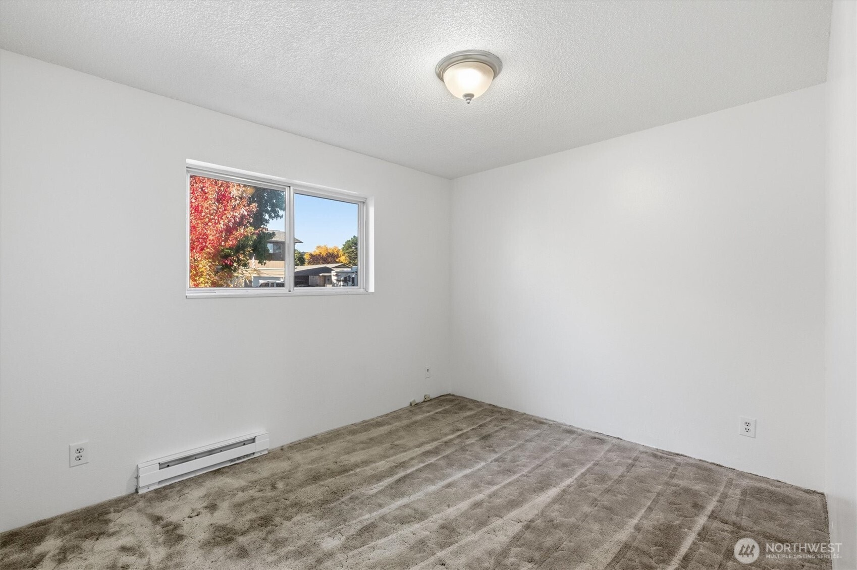 4759 Windemere Street Longview, WA 98632 - Photo 17 of 38 an empty room with a window
