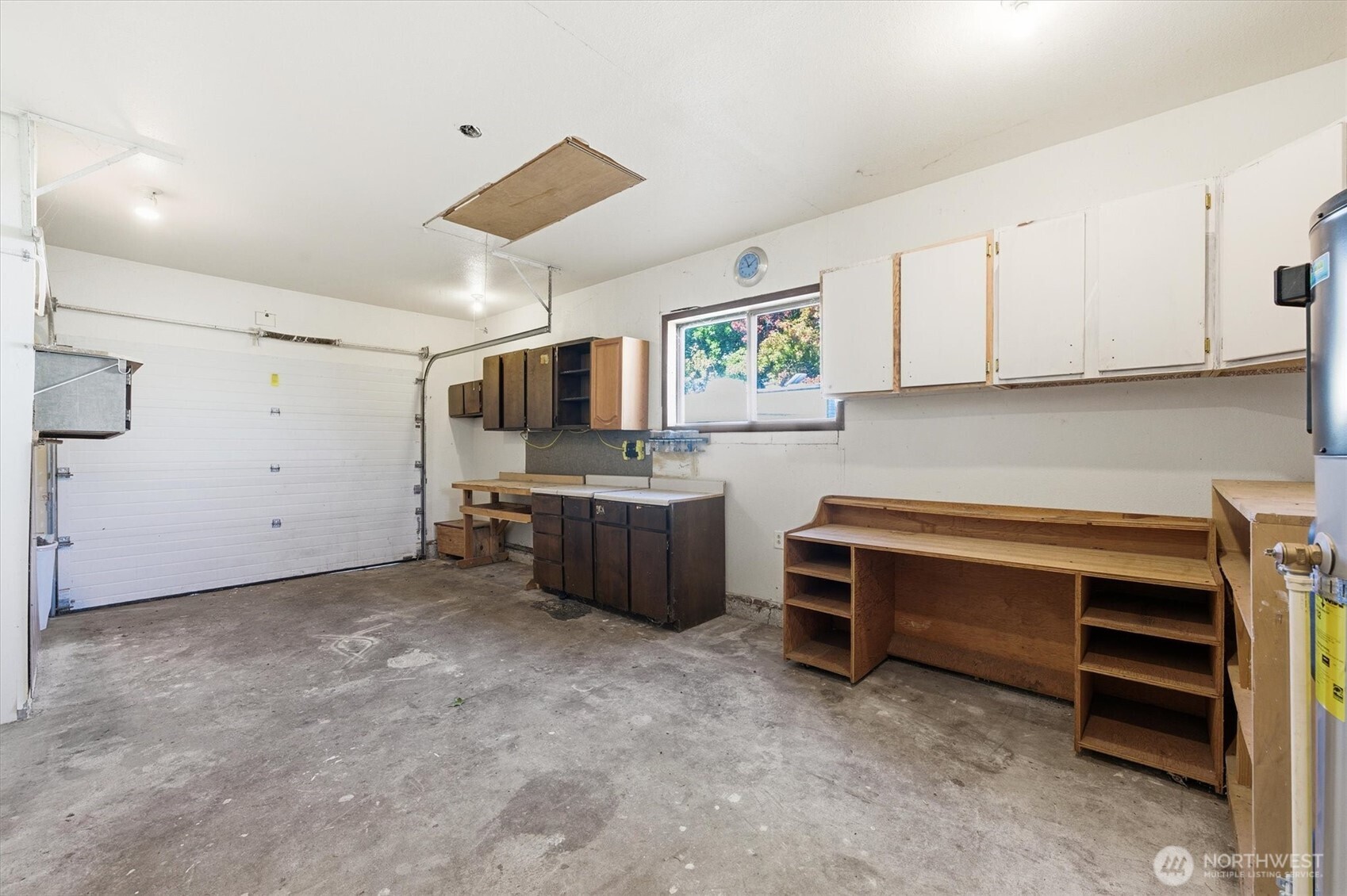 4759 Windemere Street Longview, WA 98632 - Photo 23 of 38 a kitchen with cabinets and window
