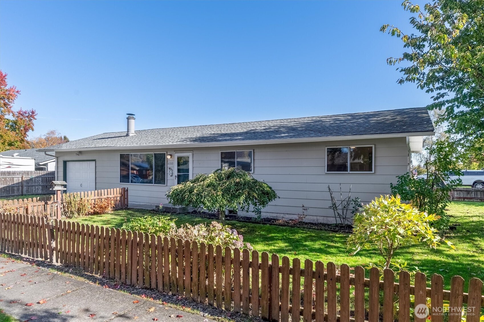4759 Windemere Street Longview, WA 98632 - Photo 25 of 38 a front view of house with yard and green space