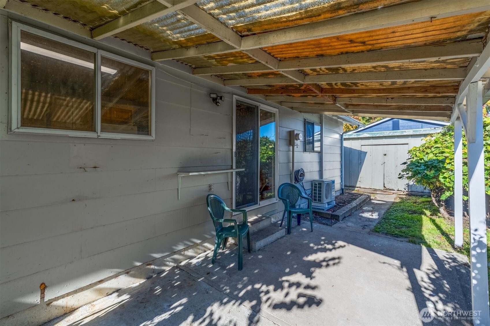 4759 Windemere Street Longview, WA 98632 - Photo 35 of 38 a view of a patio with table and chairs and potted plants