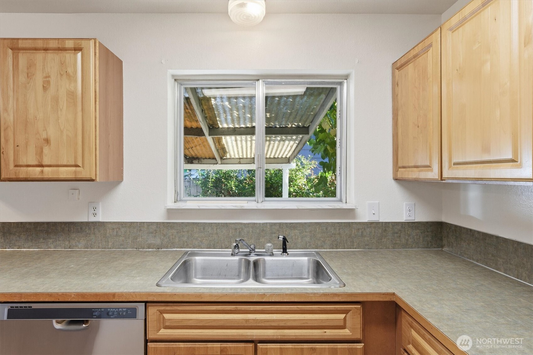 4759 Windemere Street Longview, WA 98632 - Photo 6 of 38 a kitchen with a sink and a window