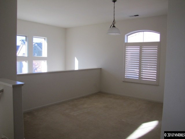 9900 Wilbur May Parkway, Unit 3405 Reno, NV 89521 - Photo 3 of 12 a view of an empty room with a window