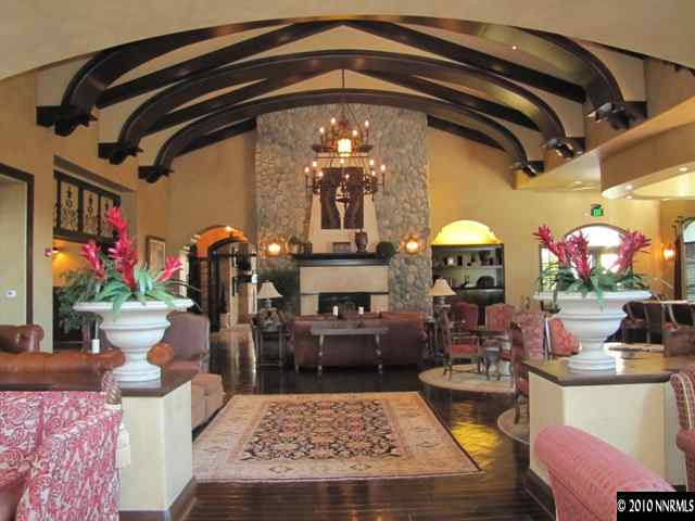 9900 Wilbur May Parkway, Unit 3405 Reno, NV 89521 - Photo 4 of 12 a living room with furniture and a fireplace