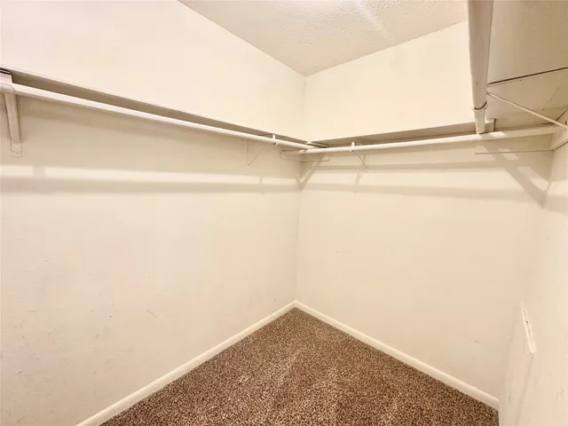 a view of small space with racks on the wall