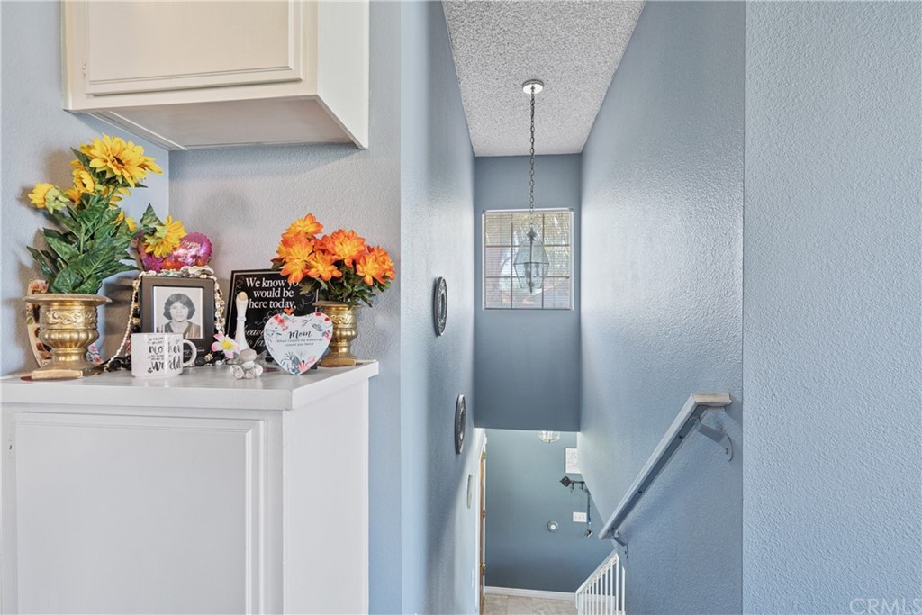 782 De La Luz Circle Perris, CA 92571 - Photo 24 of 25 a view of living room with furniture and flowers