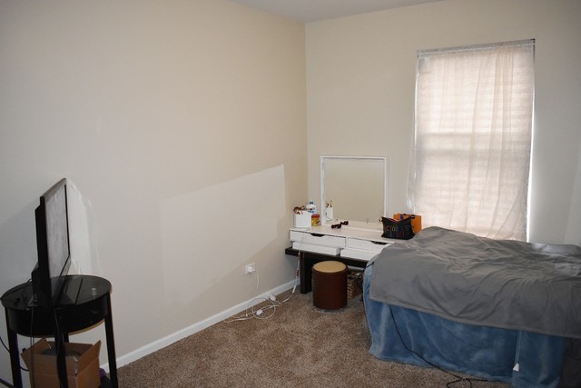1923 Brimstone Road Romeoville, IL 60446 - Photo 14 of 14 a bedroom with a bed and a window