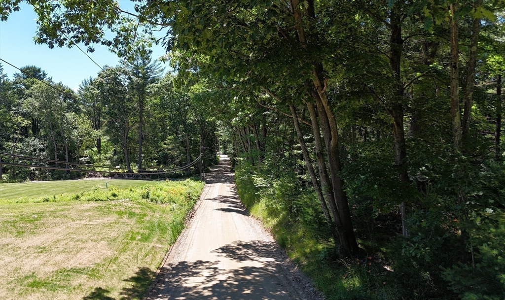 10 Sassawanna Road Rutland, MA 01543 - Photo 4 of 14 a view of a pathway both side of yard