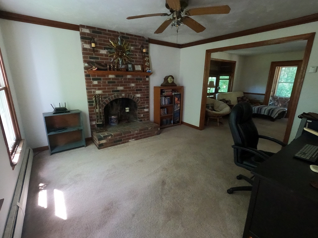 10 Sassawanna Road Rutland, MA 01543 - Photo 5 of 14 a living room with furniture and a fireplace