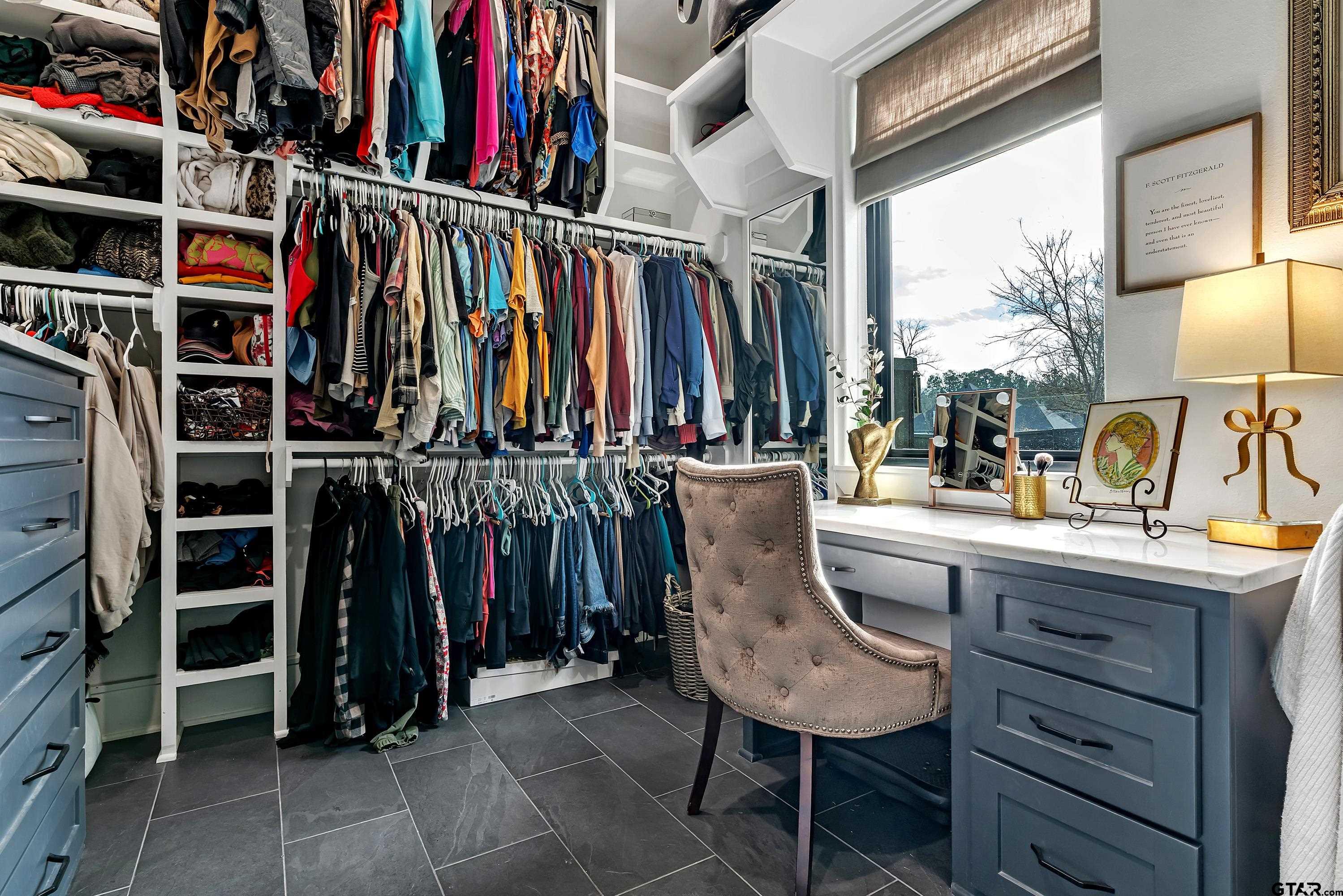 500 Roberts Circle Longview, TX 75605 - Photo 17 of 48 a view of walk in closet with clothes and shoes