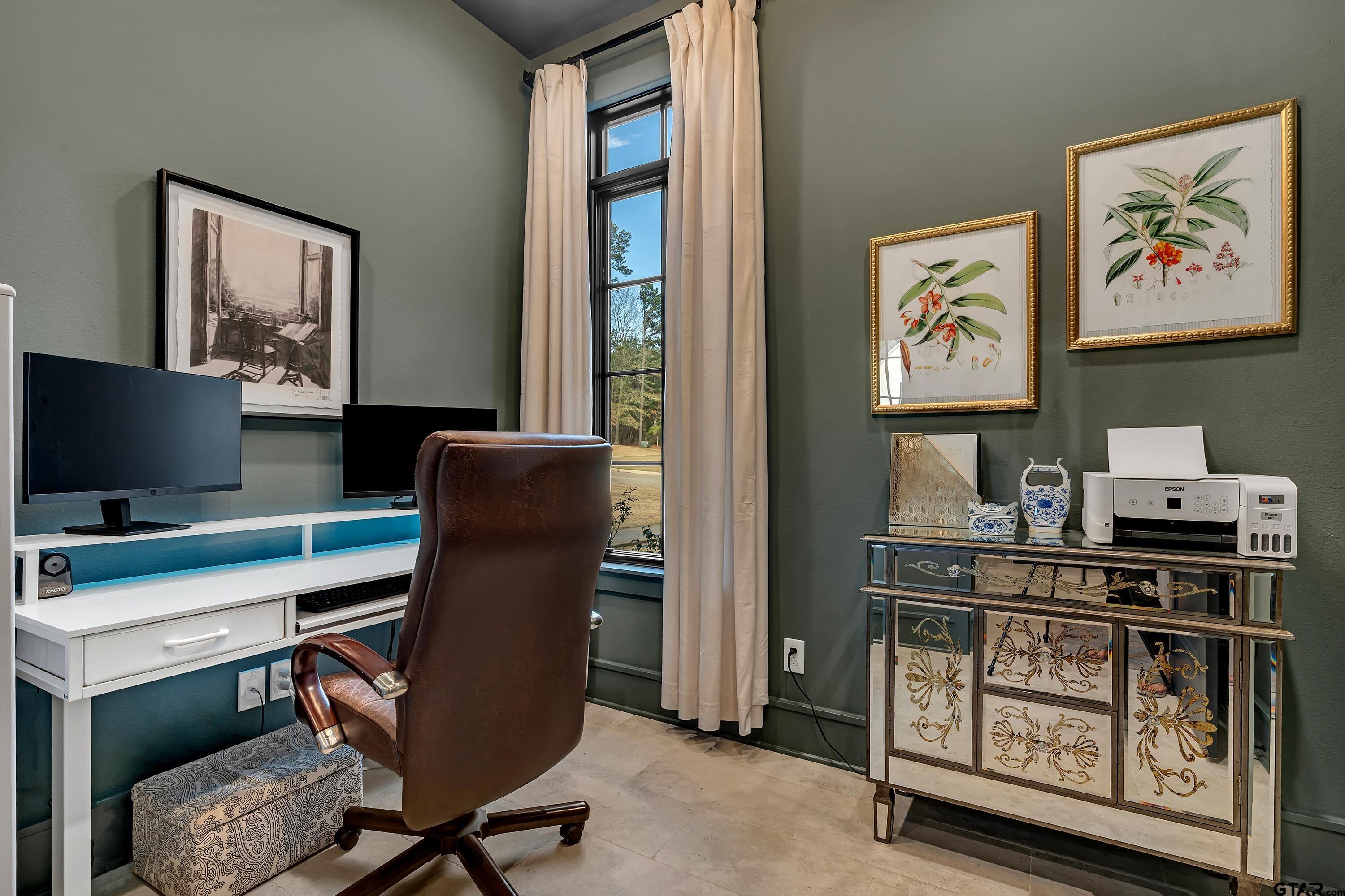 500 Roberts Circle Longview, TX 75605 - Photo 25 of 48 a view of a workspace with furniture and a window