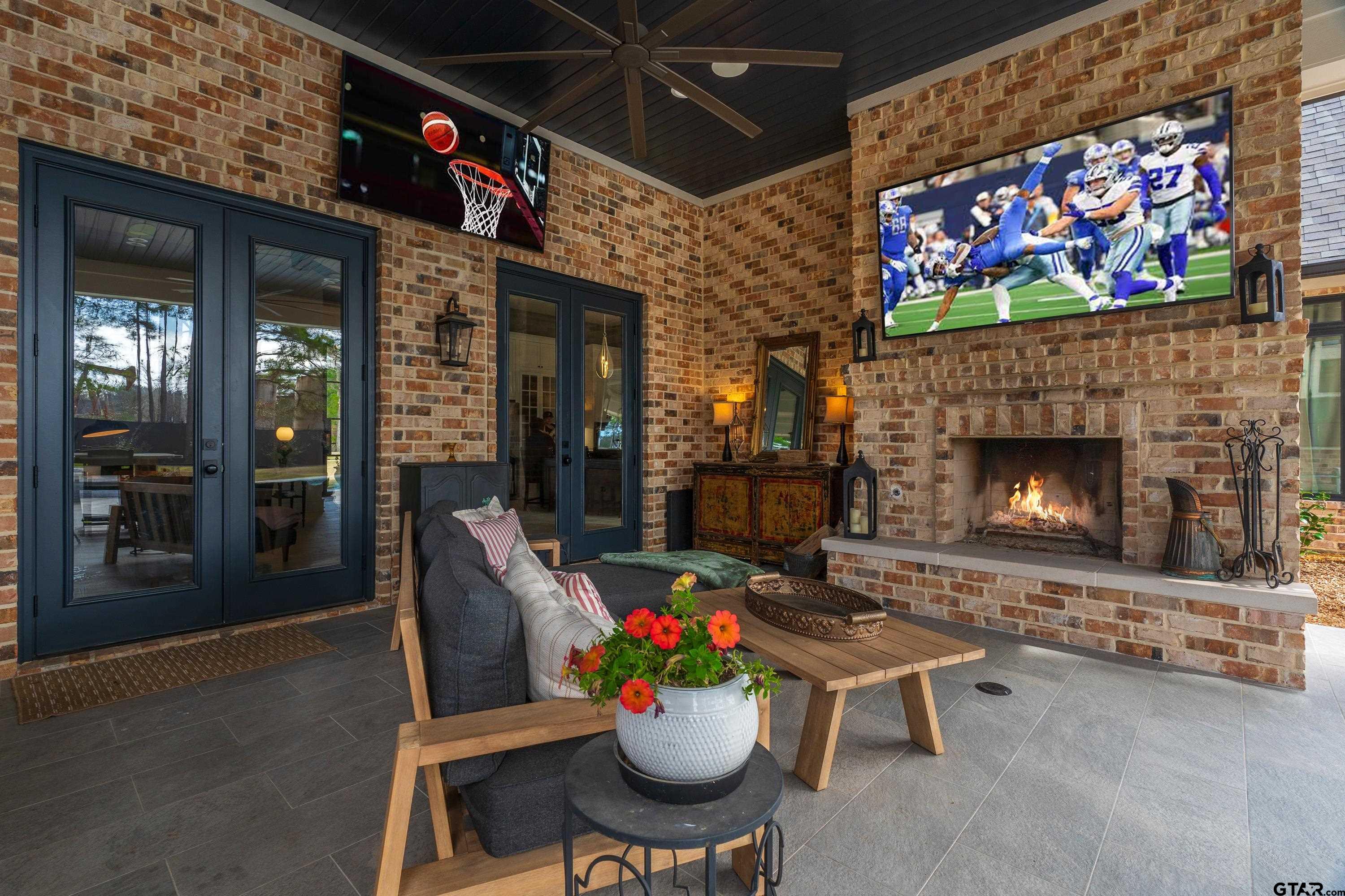 500 Roberts Circle Longview, TX 75605 - Photo 31 of 48 a living room with furniture a flat screen tv and a fireplace