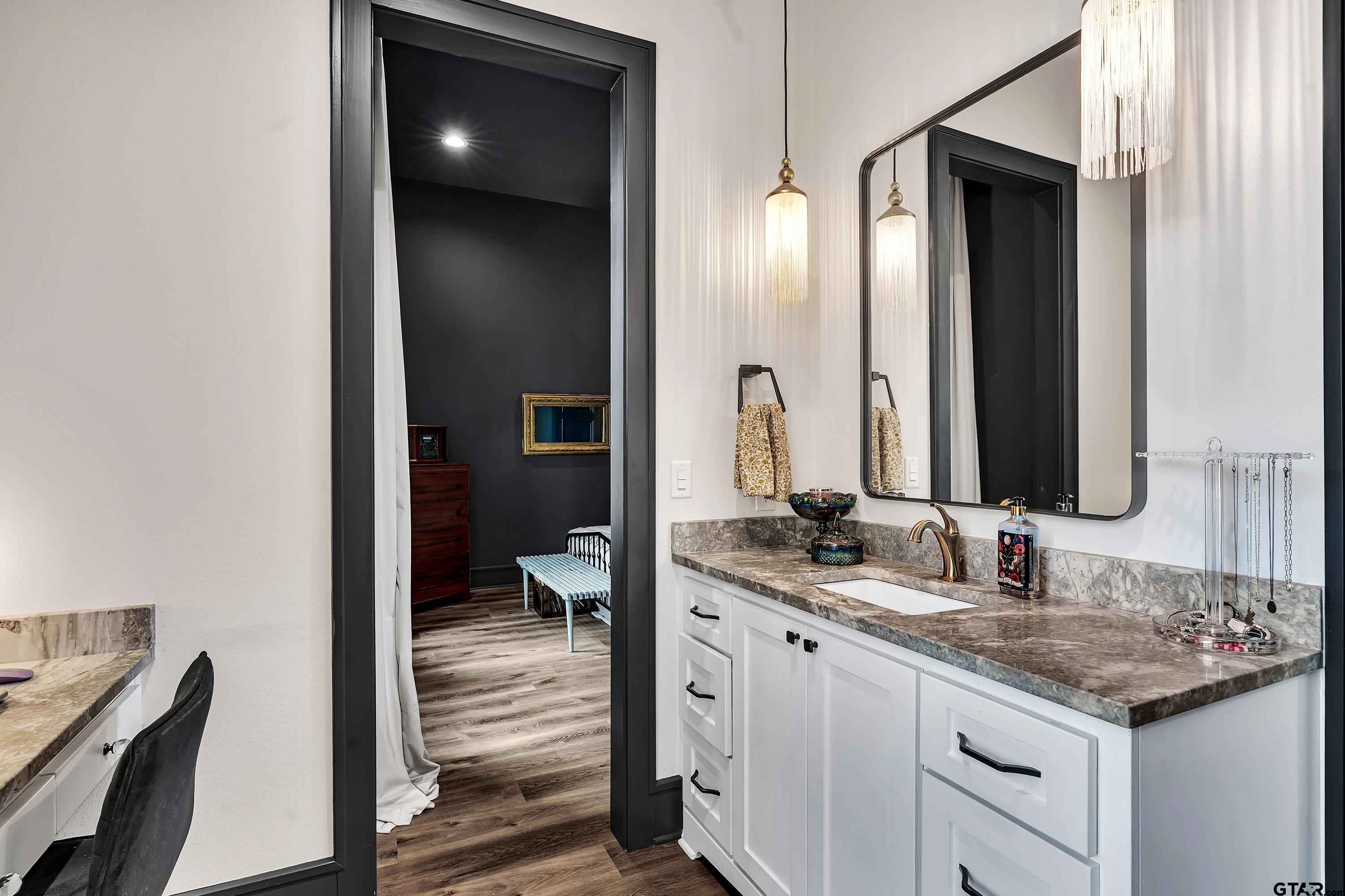 500 Roberts Circle Longview, TX 75605 - Photo 6 of 48 a bathroom with a sink and a mirror