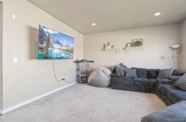 a living room with furniture and a couch