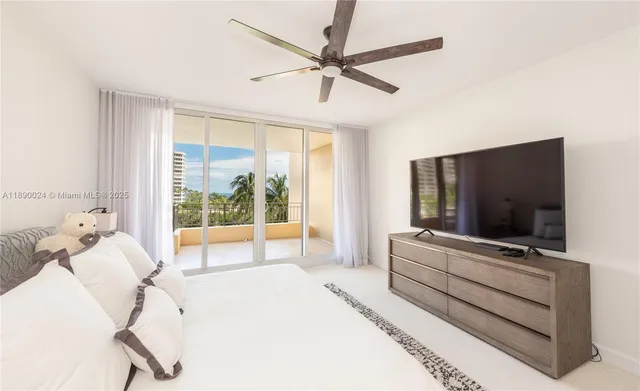 a spacious bathroom with a double vanity sink mirror double and shower