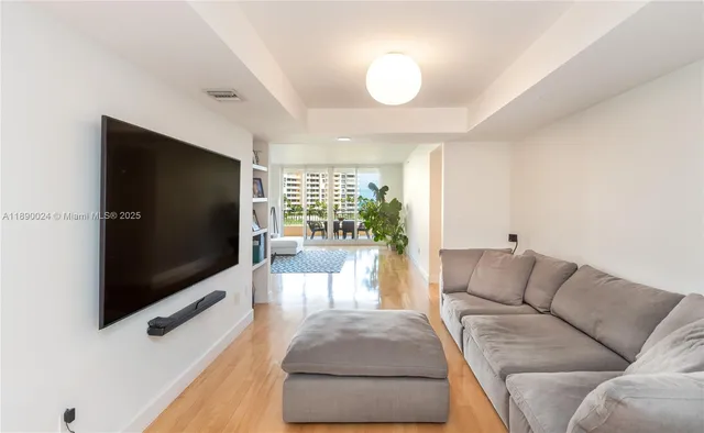 a kitchen with a sink cabinets and window