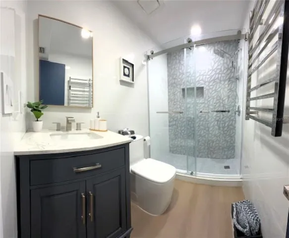 a kitchen with a sink and a refrigerator