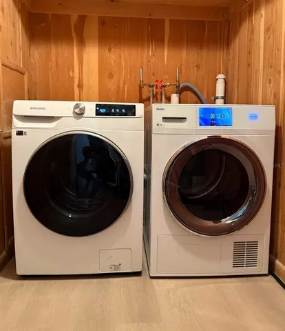 a bedroom with a bed and a night stand