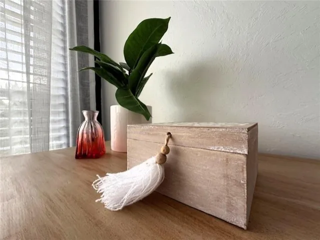 a front view of building with yard