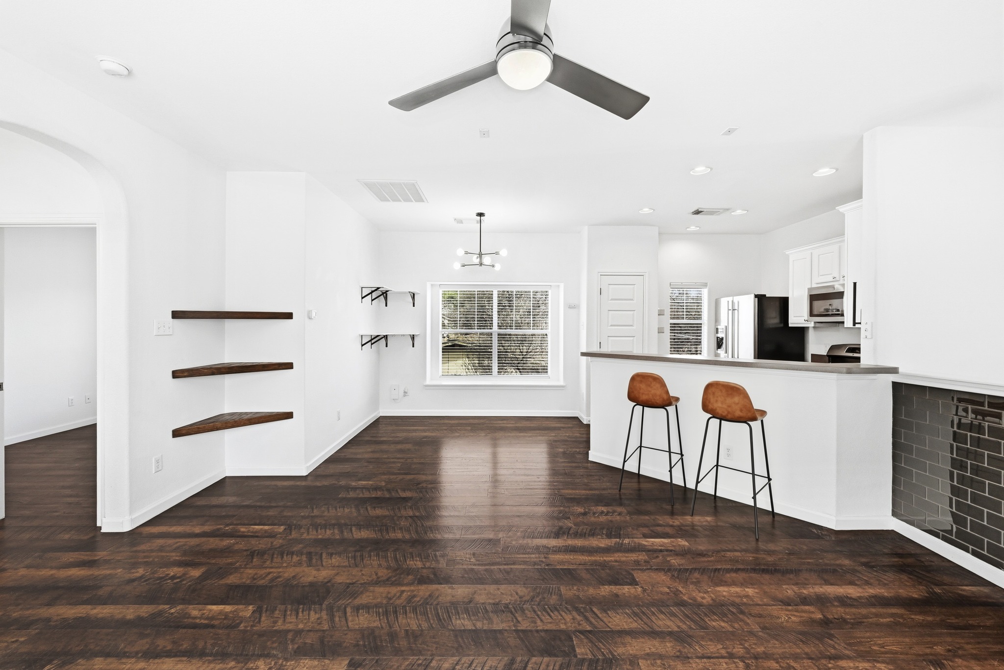 This Edgewick condo offers a rare gated retreat in East Austin, featuring a 1-bedroom, 1-bathroom two-story layout that perfectly captures the energy of the up and coming Red River District