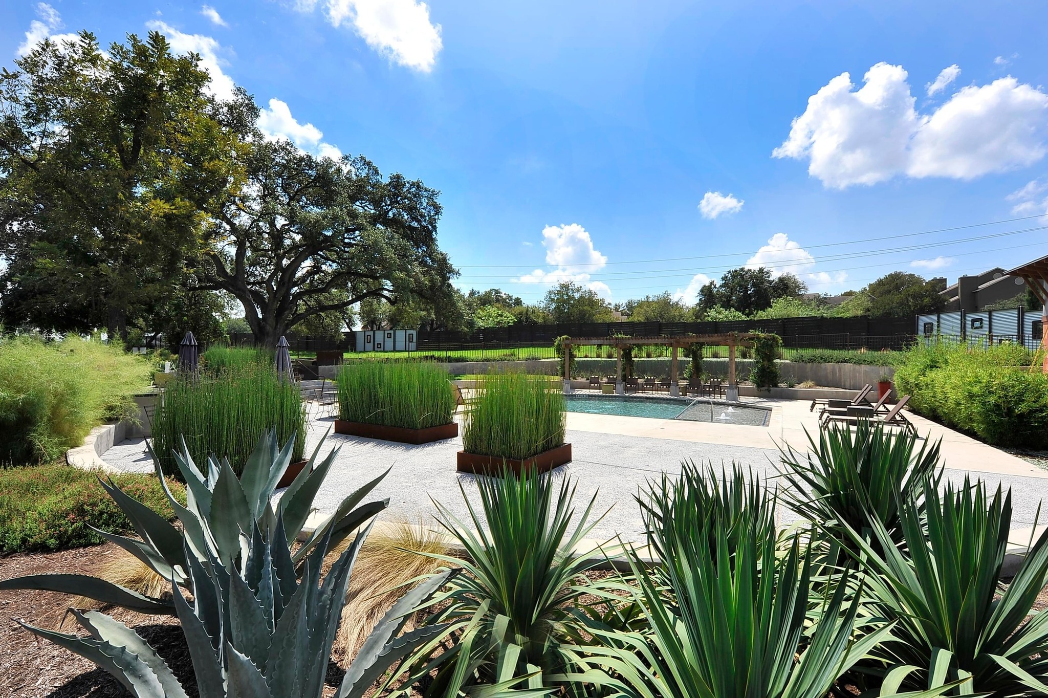 2821 Saville Loop, Unit 21C Austin, TX 78741 - Photo 26 of 31 Residents at Edgewick have access to this gated pool area, offering a quiet place to swim or relax just steps from the front door