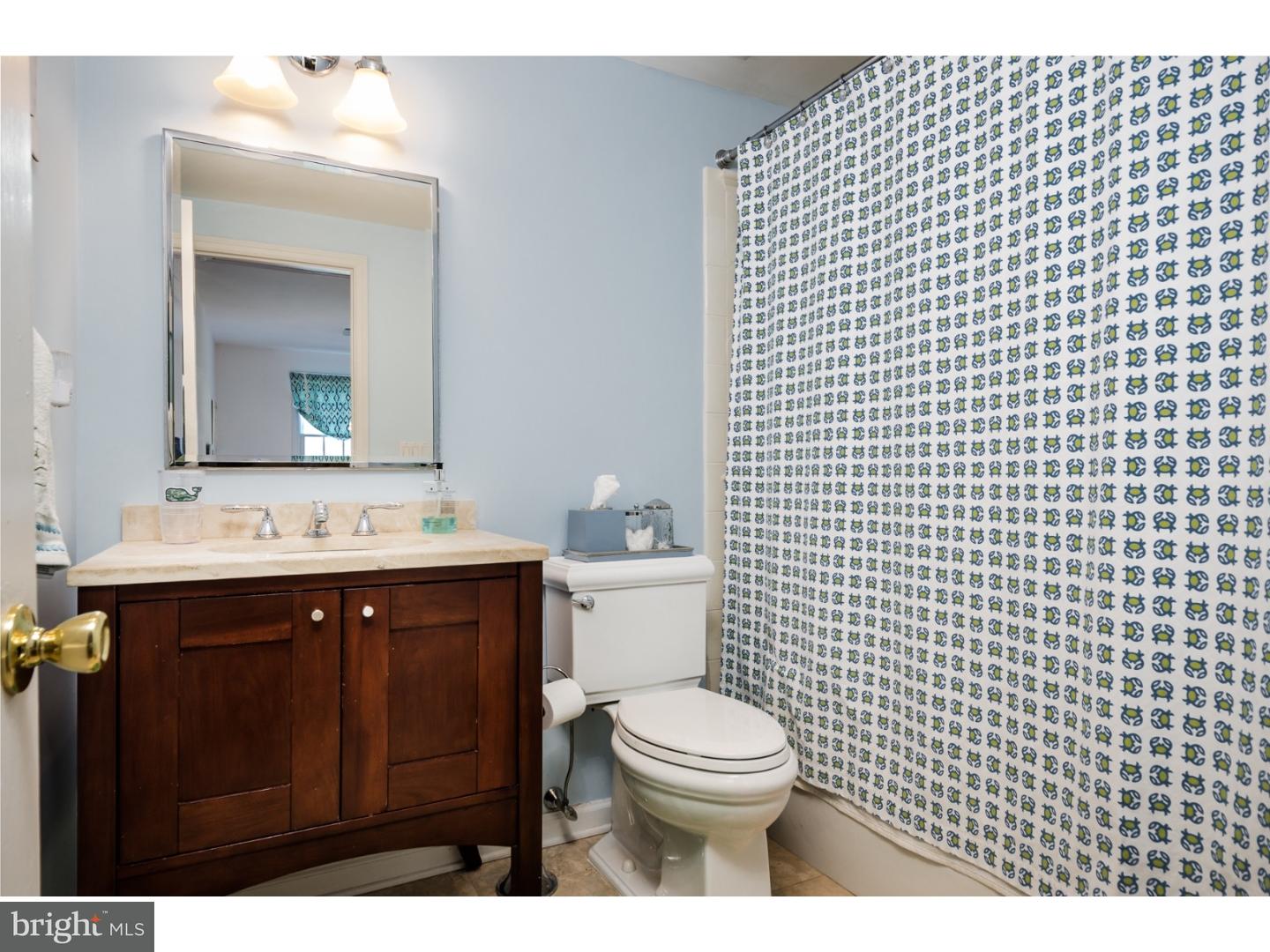 78 Bayberry Road Princeton, NJ 08540 - Photo 16 of 25 a bathroom with a sink vanity mirror and toilet