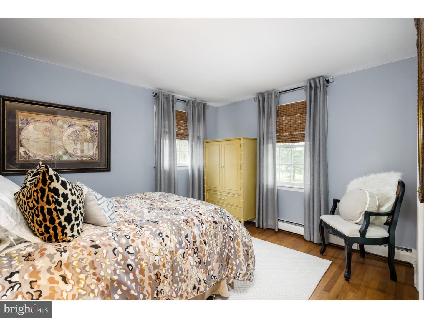 78 Bayberry Road Princeton, NJ 08540 - Photo 17 of 25 a bedroom with a bed and a chair