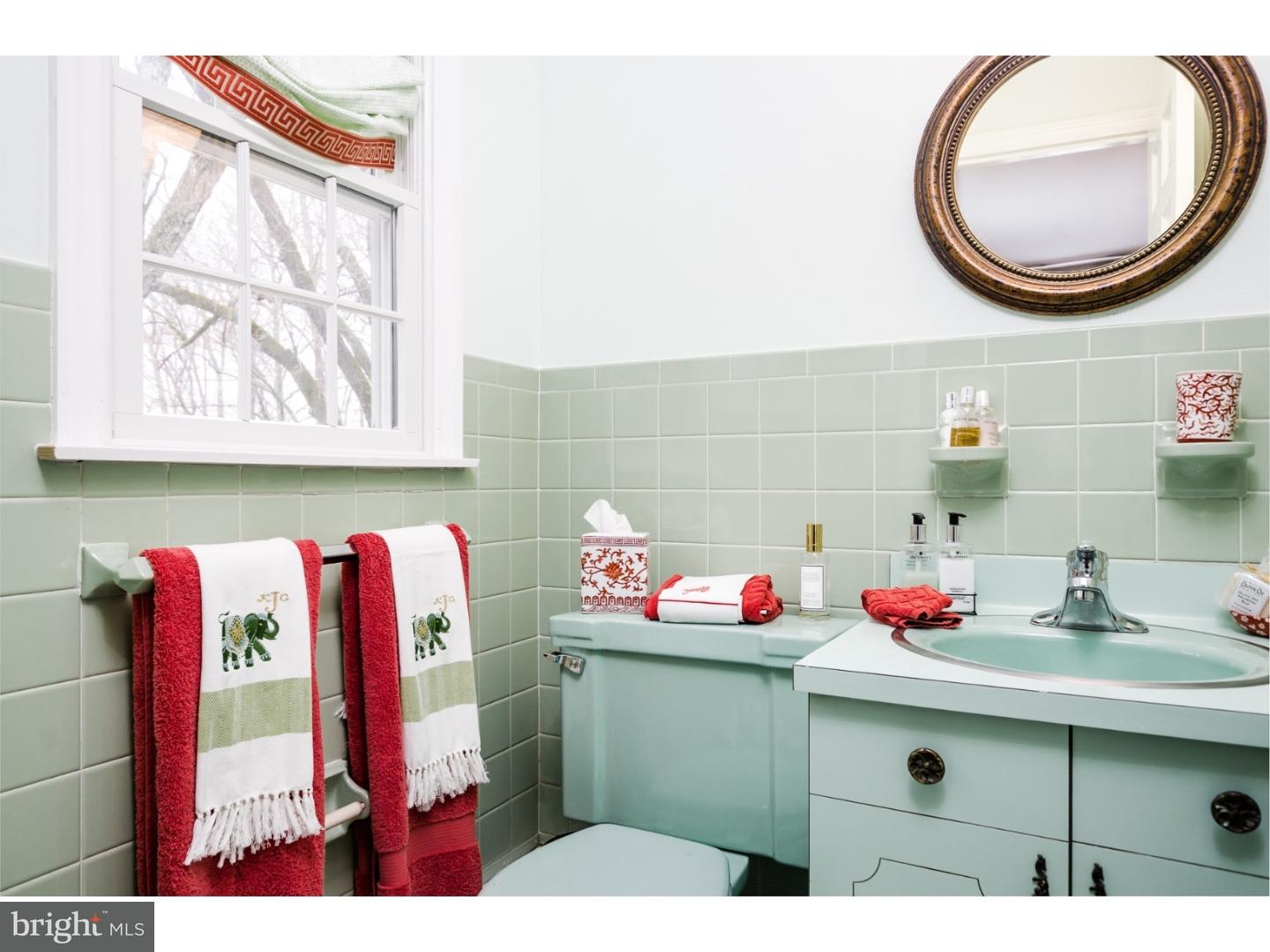 78 Bayberry Road Princeton, NJ 08540 - Photo 18 of 25 a bathroom with a sink and a mirror