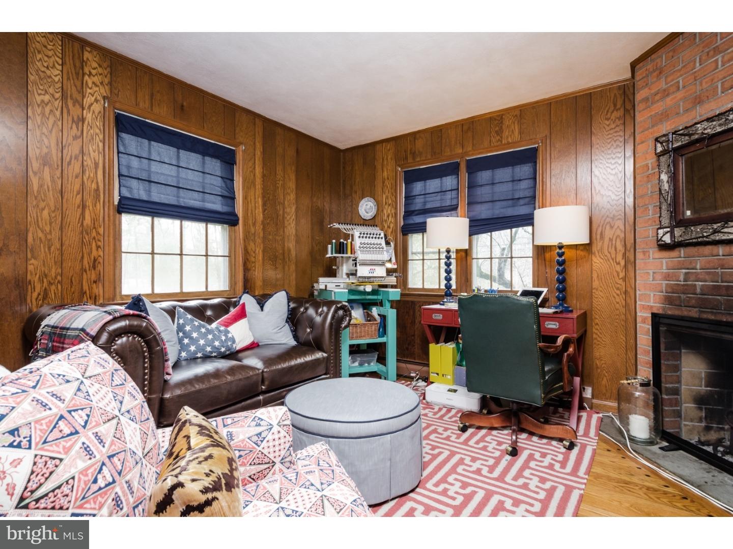 78 Bayberry Road Princeton, NJ 08540 - Photo 20 of 25 a living room with furniture a window and a fireplace