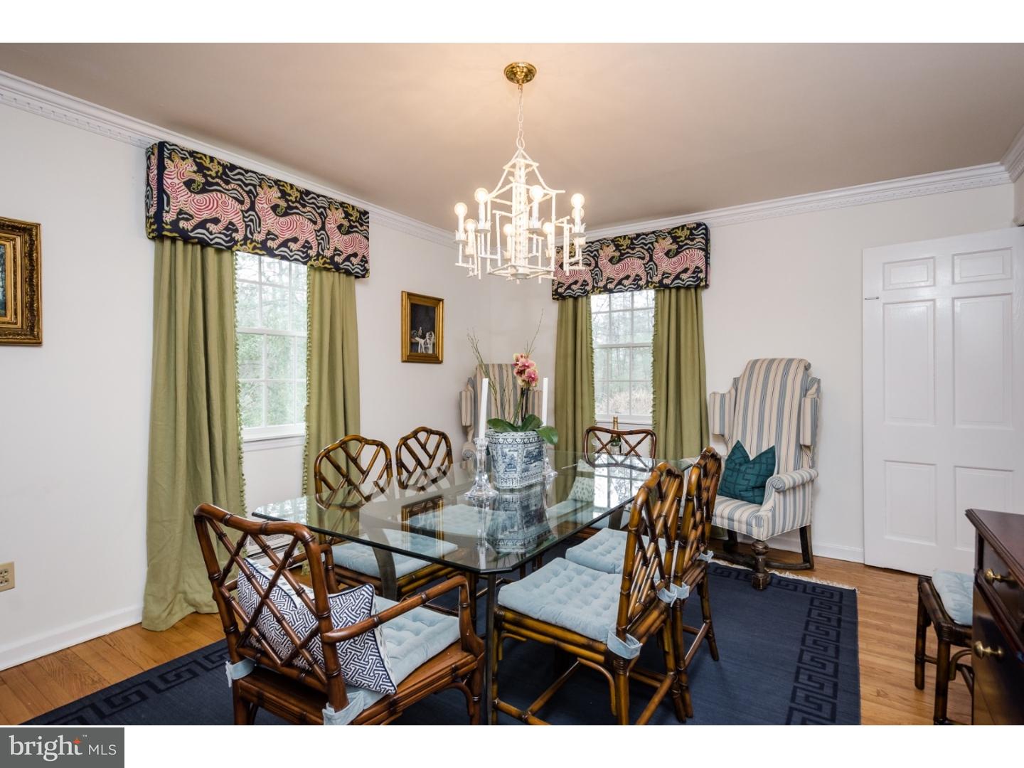 78 Bayberry Road Princeton, NJ 08540 - Photo 9 of 25 a view of a dining room with furniture and a chandelier