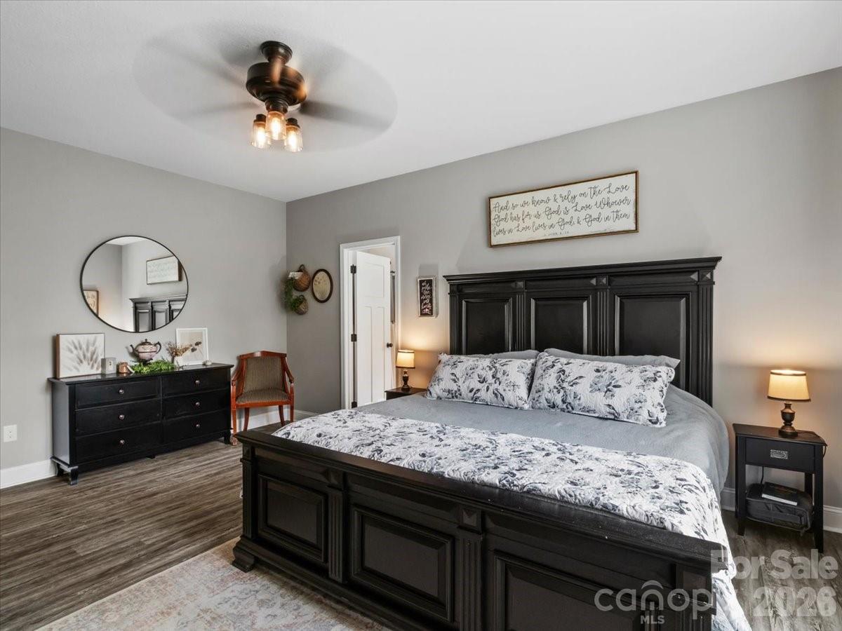 36 Cherry Ridge Lane Weaverville, NC 28787 - Photo 17 of 37 a bedroom with a bed and dresser with mirror