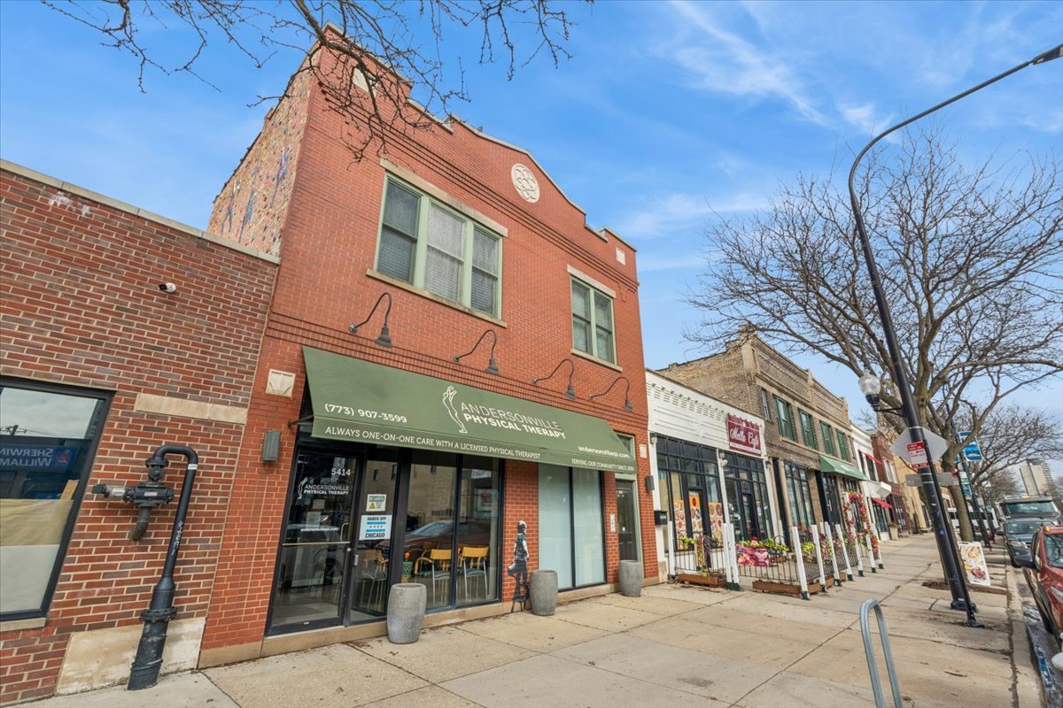 5414 North Broadway, Unit 2 Chicago, IL 60640 - Photo 2 of 18 a view of a brick building with many windows