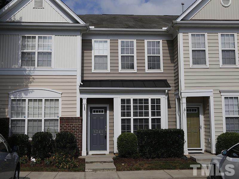 8341 City Loft Court Raleigh, NC 27613 - Photo 1 of 19 a front view of a house with a yard