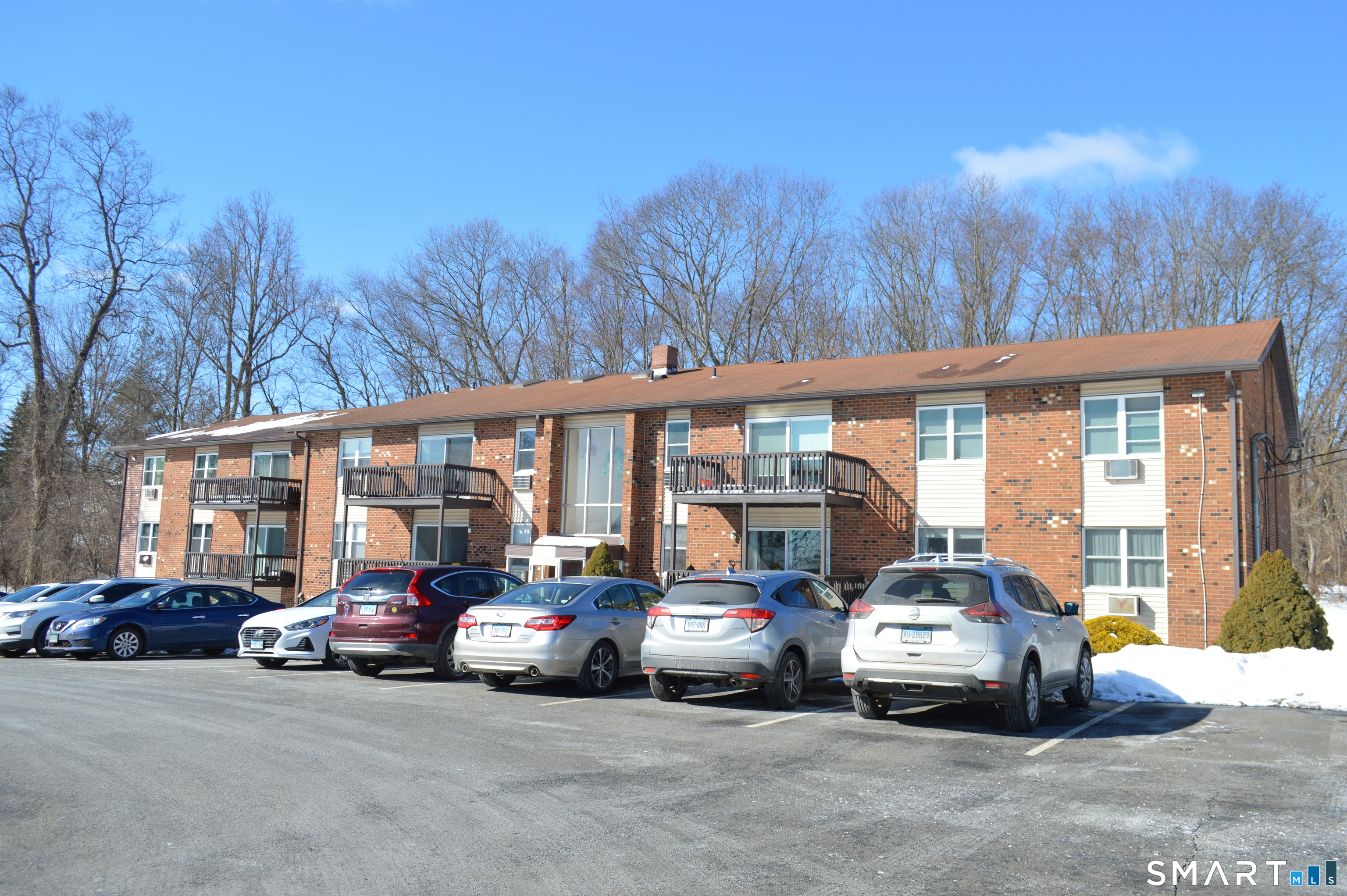 57 Balance Rock Road, Unit 17 Seymour, CT 06483 - Photo 3 of 18 a view of a cars parked in front of a house