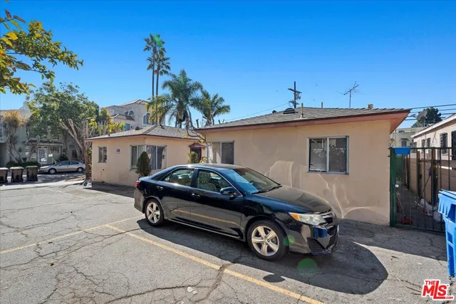 a car parked in front of a house