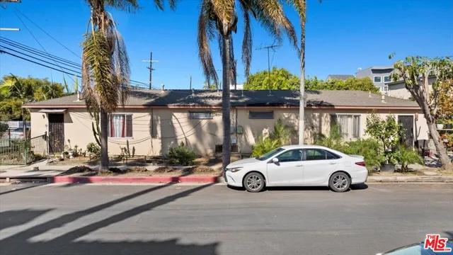 a car parked in front of a building