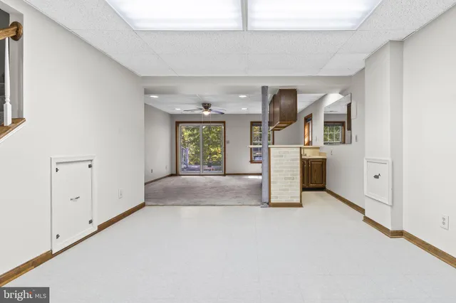 an empty room with windows