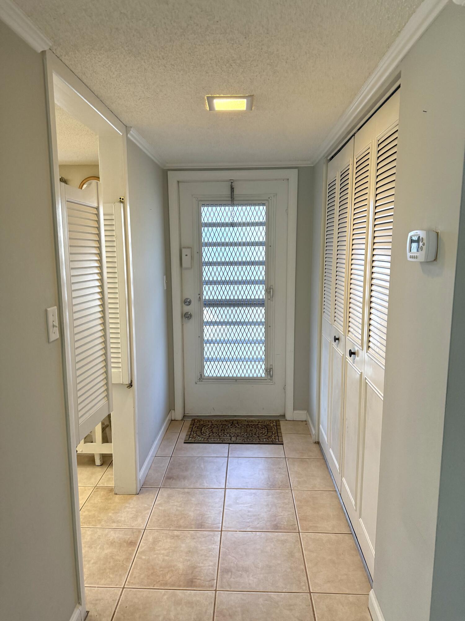 9272 Southwest 3rd Street, Unit 407 Boca Raton, FL 33428 - Photo 4 of 51 Entry Hallway