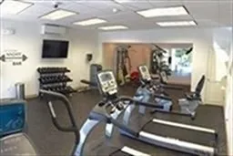 a view of a livingroom with furniture and flat screen tv