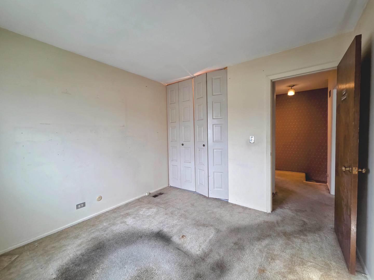 1481 Quaker Lane, Unit 117B Prospect Heights, IL 60070 - Photo 19 of 24 a view of an empty room