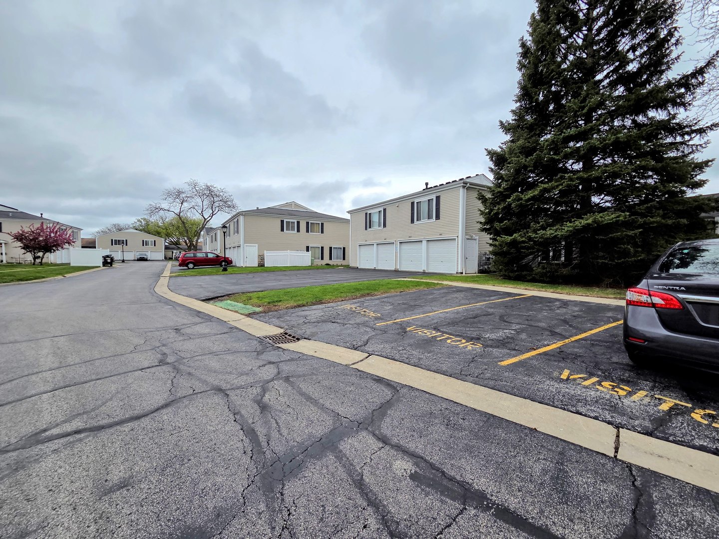 1481 Quaker Lane, Unit 117B Prospect Heights, IL 60070 - Photo 22 of 24 a view of a street with cars on the road