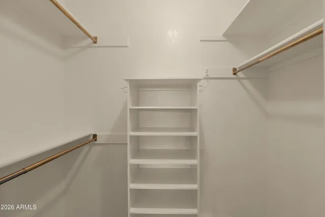 a view of an empty walk in closet