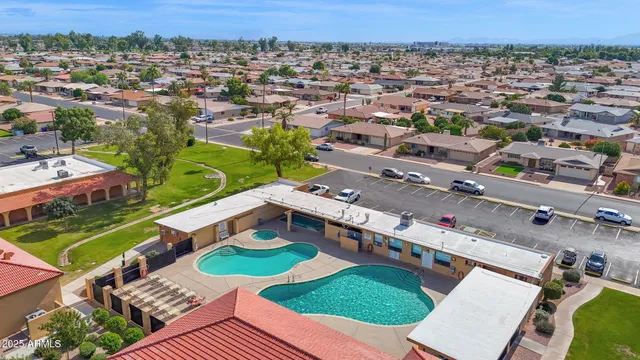 an aerial view of a house with a garden