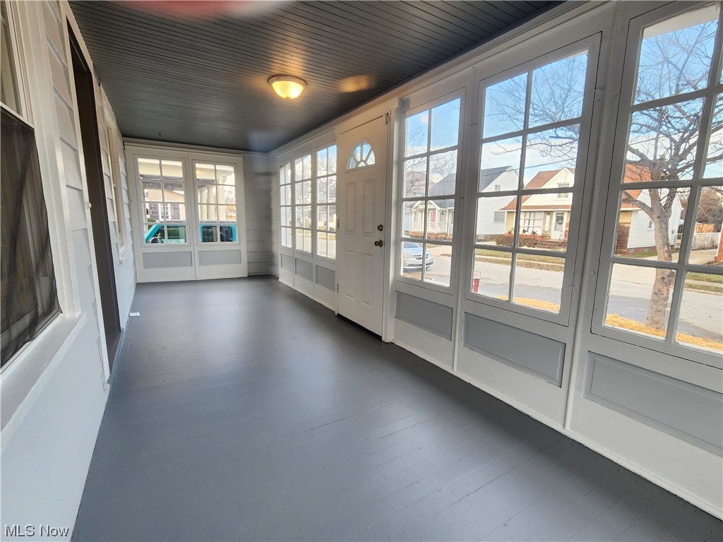 17814 Crestland Road Cleveland, OH 44119 - Photo 37 of 49 Unfurnished sunroom with wood ceiling