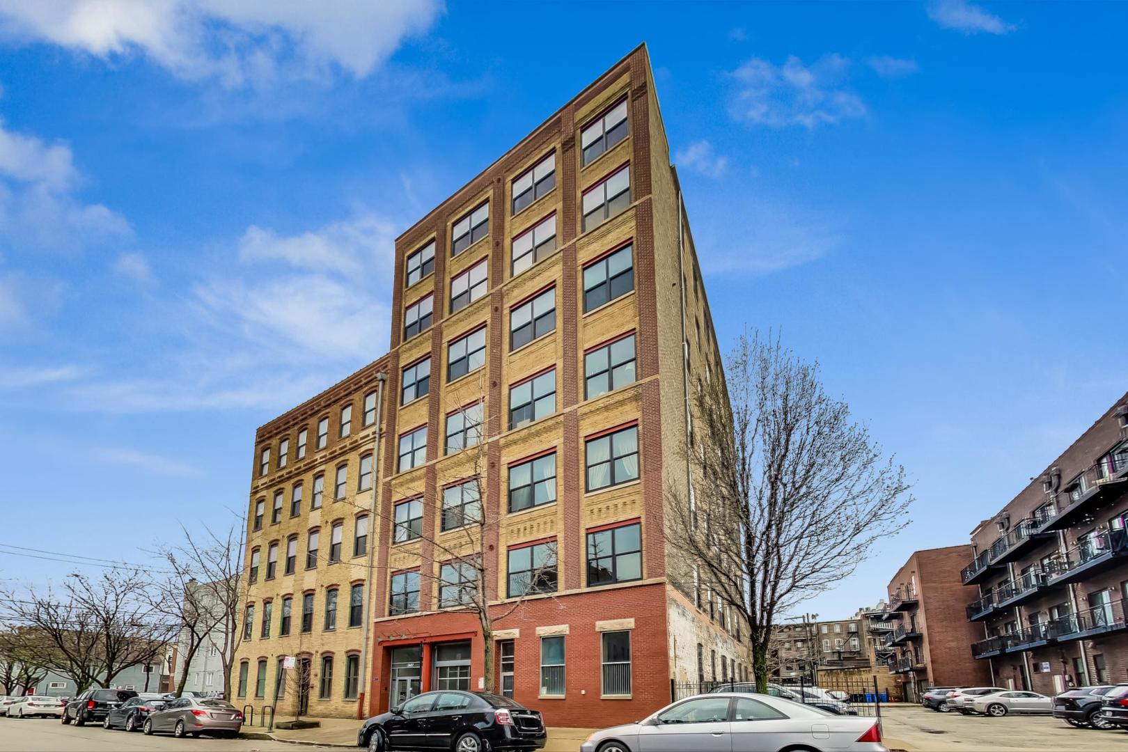 1147 West Ohio Street, Unit 201 Chicago, IL 60642 - Photo 1 of 54 a front view of a building