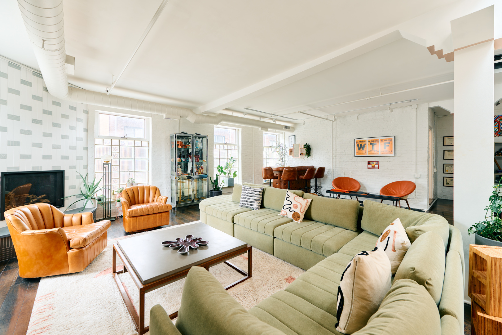 1147 West Ohio Street, Unit 201 Chicago, IL 60642 - Photo 11 of 54 a living room with furniture and a fireplace
