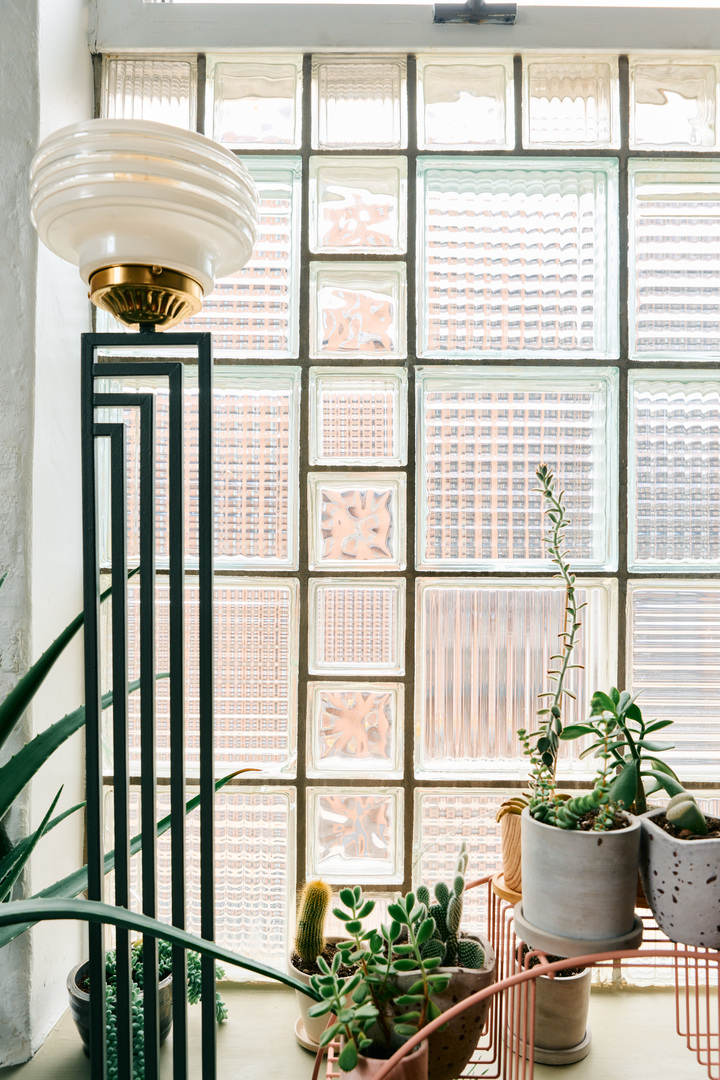 1147 West Ohio Street, Unit 201 Chicago, IL 60642 - Photo 17 of 54 a dining room filled with furniture and a potted plant