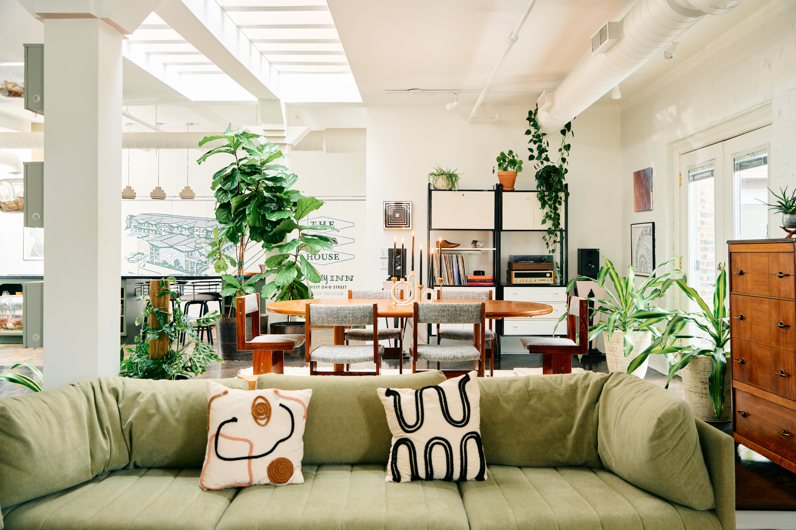 1147 West Ohio Street, Unit 201 Chicago, IL 60642 - Photo 24 of 54 a living room with furniture and a large window