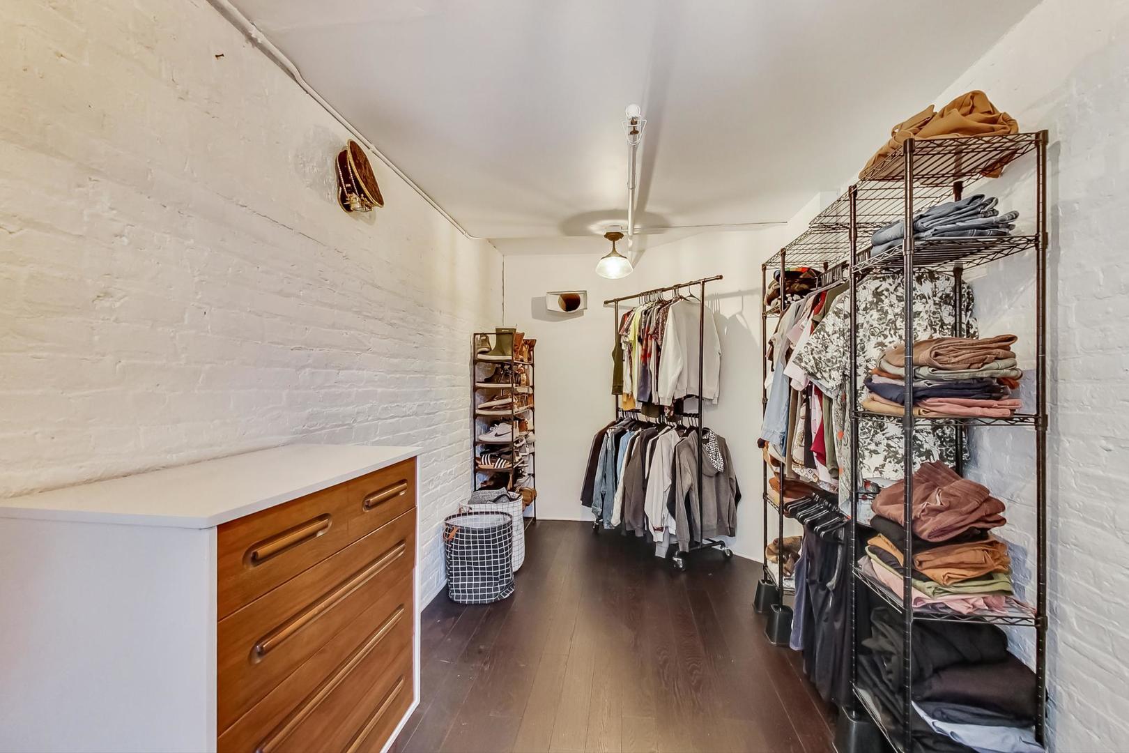 1147 West Ohio Street, Unit 201 Chicago, IL 60642 - Photo 42 of 54 a view of a room with gym equipment